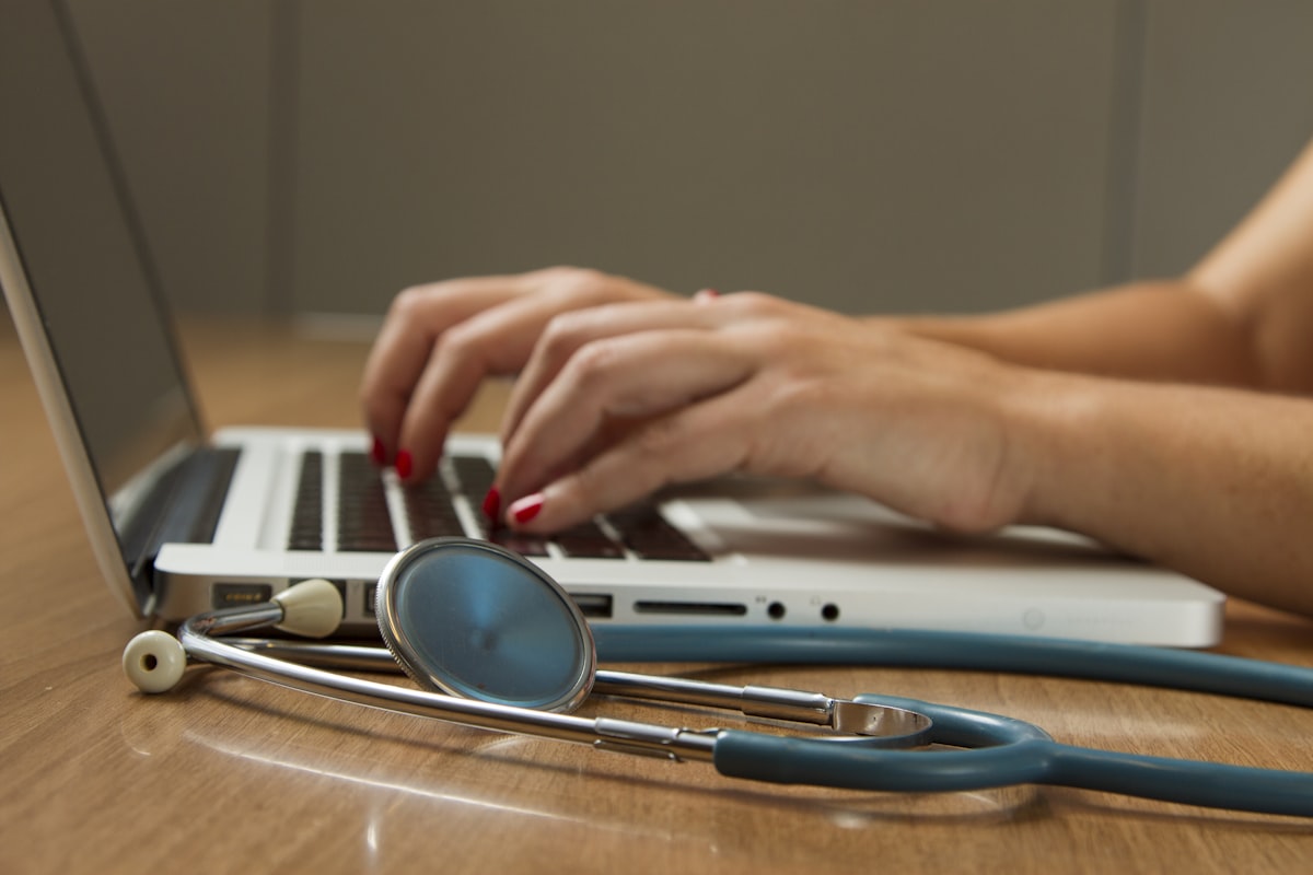 Healthcare professional consulting with patient about medical supplies